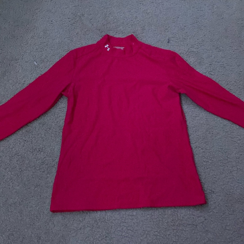 This is a pink under armor, long sleeve shirt